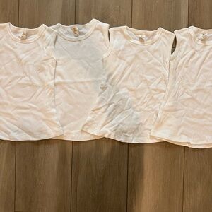 100% cotton T-shirt dresses. Brand new never used. 4 dresses included